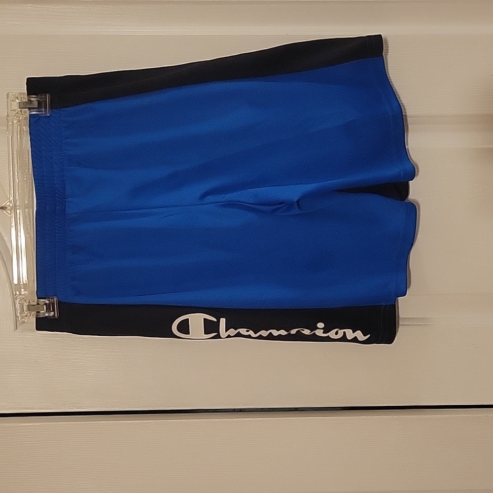 Champion 2 pack of shorts in Boys size 14/16. One blue. One black. New w/o tags.